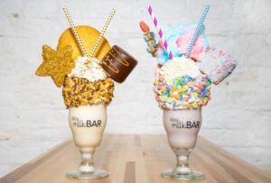 Milkshakes piled high with treats from Jojo's Milk bar | Bobby's Bike Hike Food tours