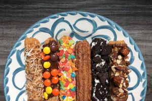 A variety of churros from Bodega imports | Bobby's Bike Hike Food tours