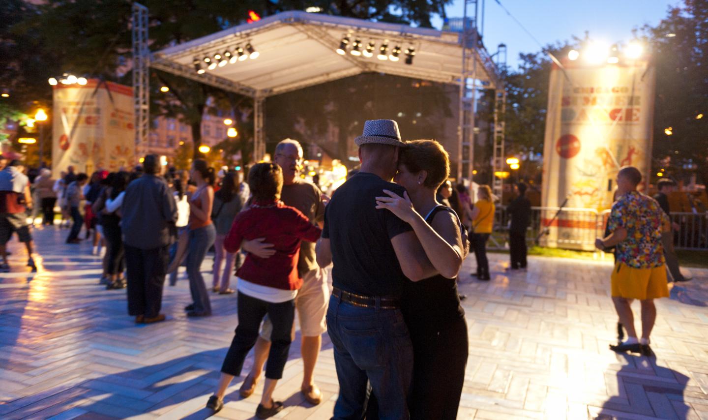 Couple dancing on the dance floor in grant park