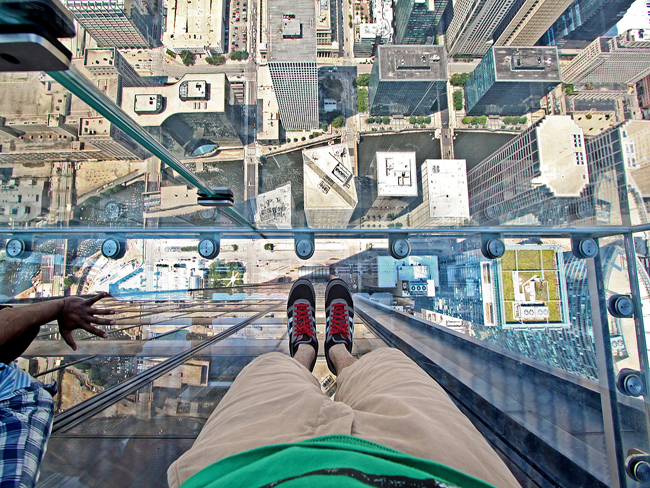 looking down at Chicago from the willis tower skydeck